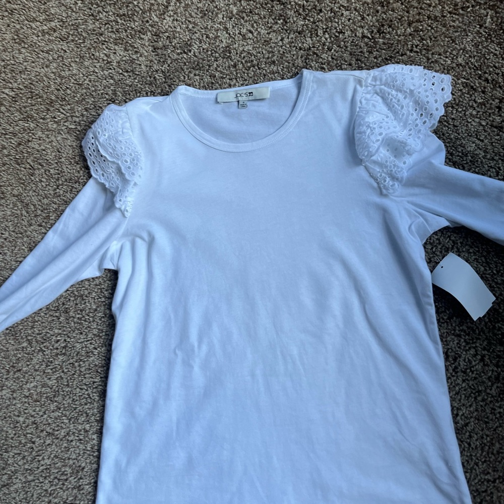 Really cute Joe’s jeans white ruffle T
